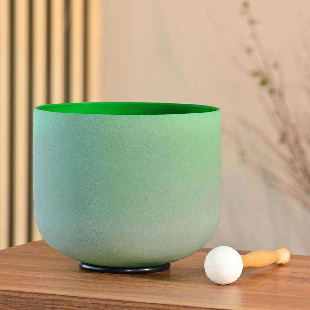 Frosted mint-green F Note Heart Chakra Crystal Singing Bowl with wooden mallet