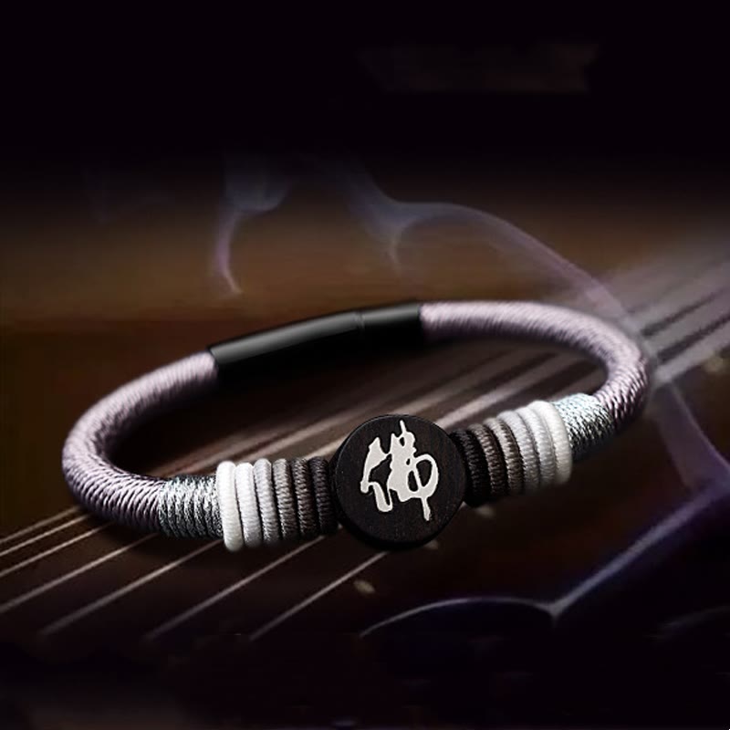 Handcrafted Ebony Buddha Bracelet with Red String | Protection