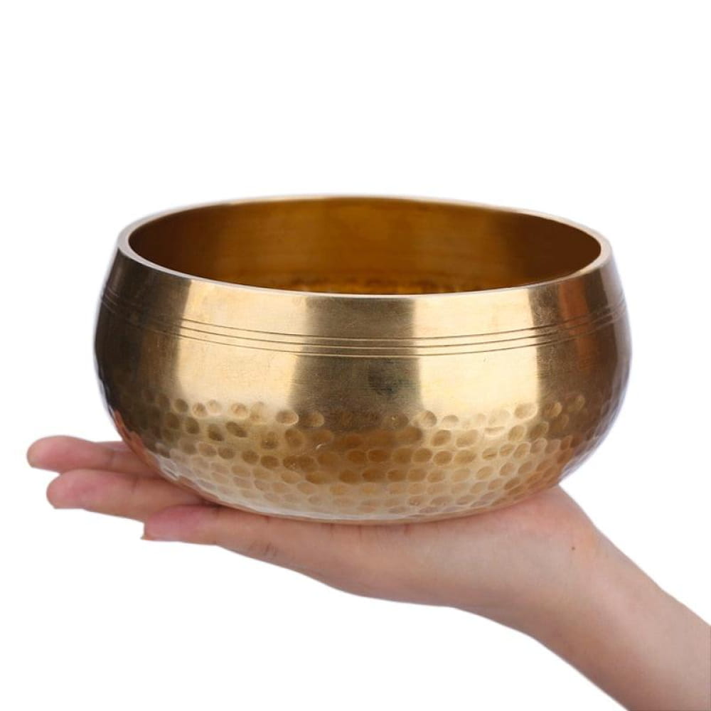 Hammered brass Tibetan singing bowl with smooth rim for meditation and relaxation