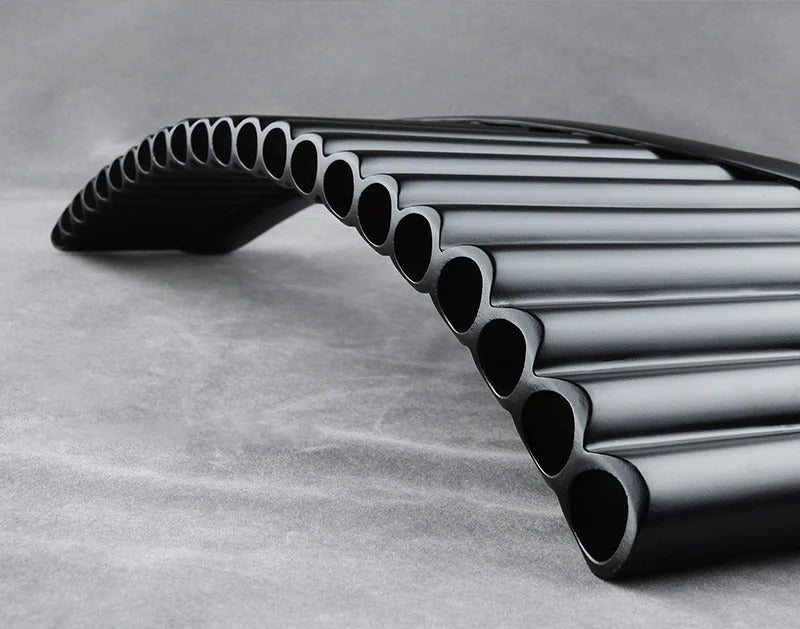 Row of curved metal pipes in wave pattern for Handmade Bamboo Pan Flute G/C Key