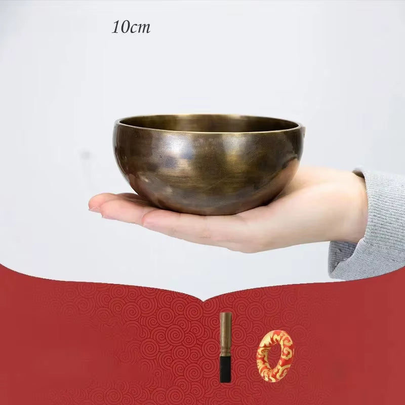 Bronze singing bowl on palm for Handmade Copper Tibetan Singing Bowl Meditation