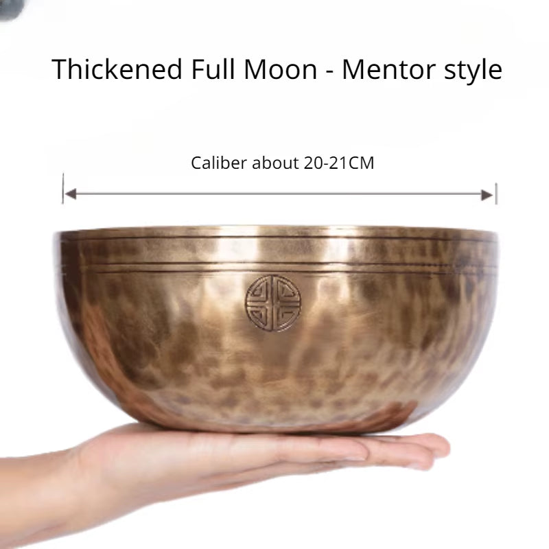 Hand-hammered Tibetan Singing Bowl with etched decorative symbol and full moon design