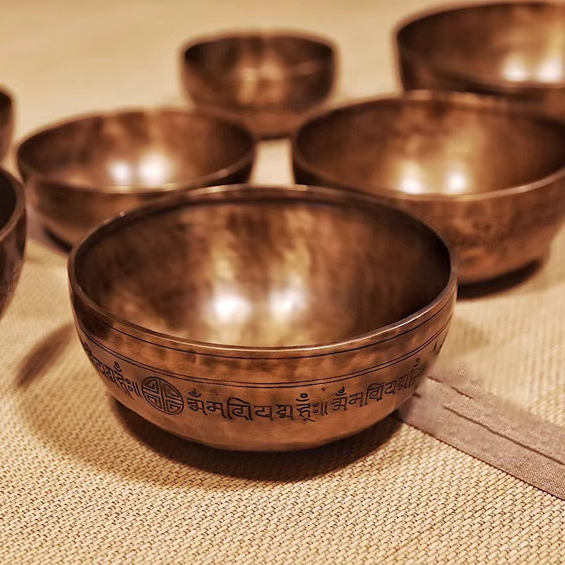 Tibetan singing bowl with etched designs for meditation from Handmade Nepal