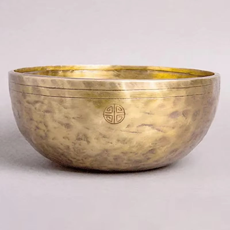 Hammered brass Handmade Tibetan Singing Bowl with etched symbol design