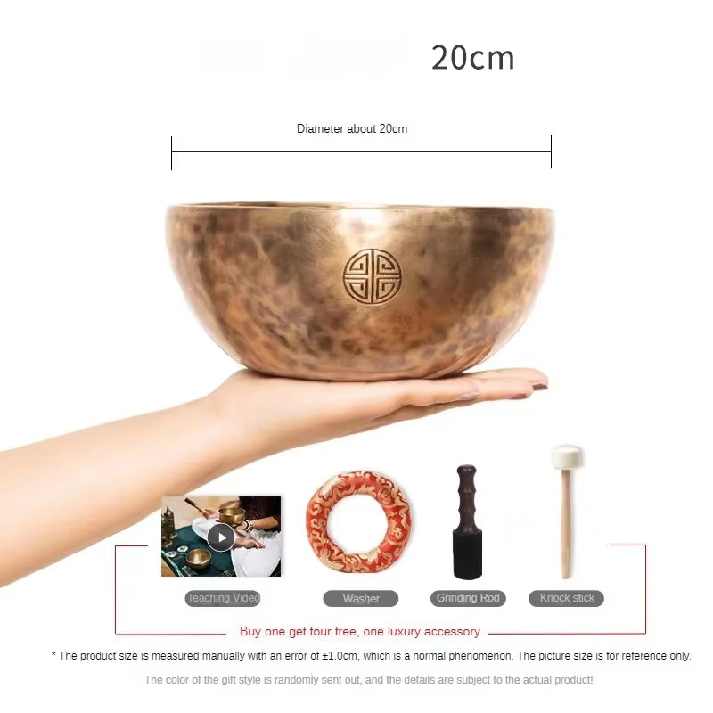 Hand-hammered copper singing bowl with an etched geometric symbol for healing