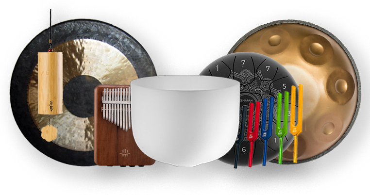 Collection of sound healing instruments including a gong, kalimba, crystal bowl, handpan