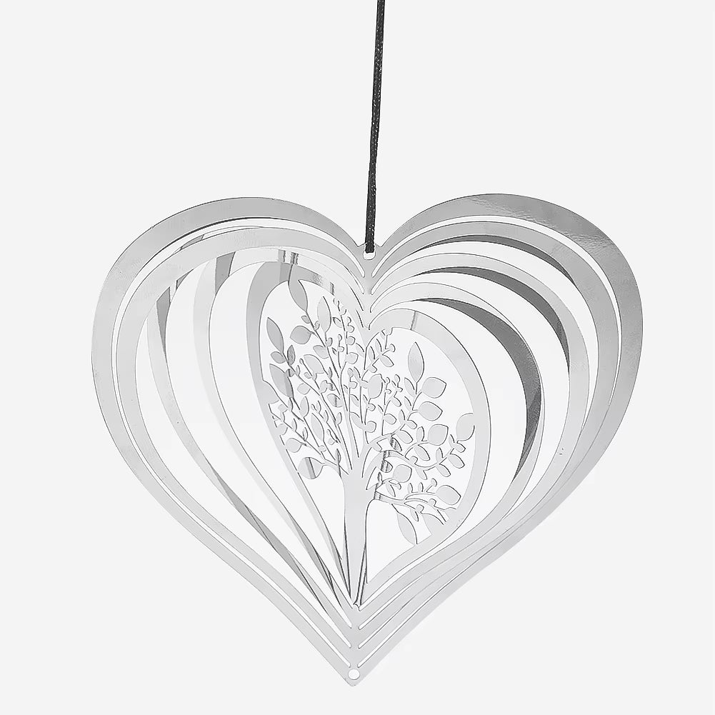 White metal heart-shaped ornament with floral design in Heart Tree of Life Wind Spinner