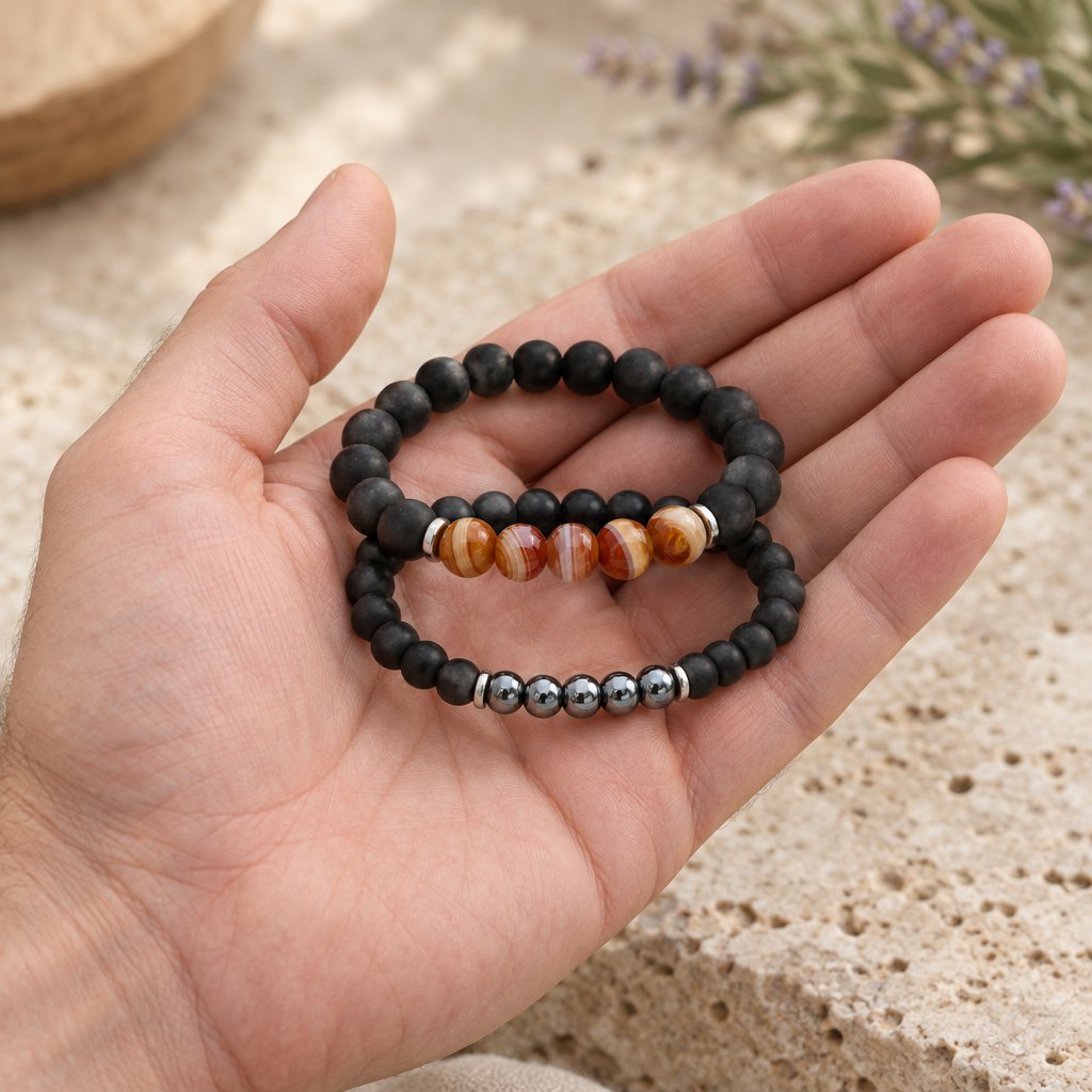 Hematite Agate Bracelet Set for Protection and Balance, held in the hand to show its real size