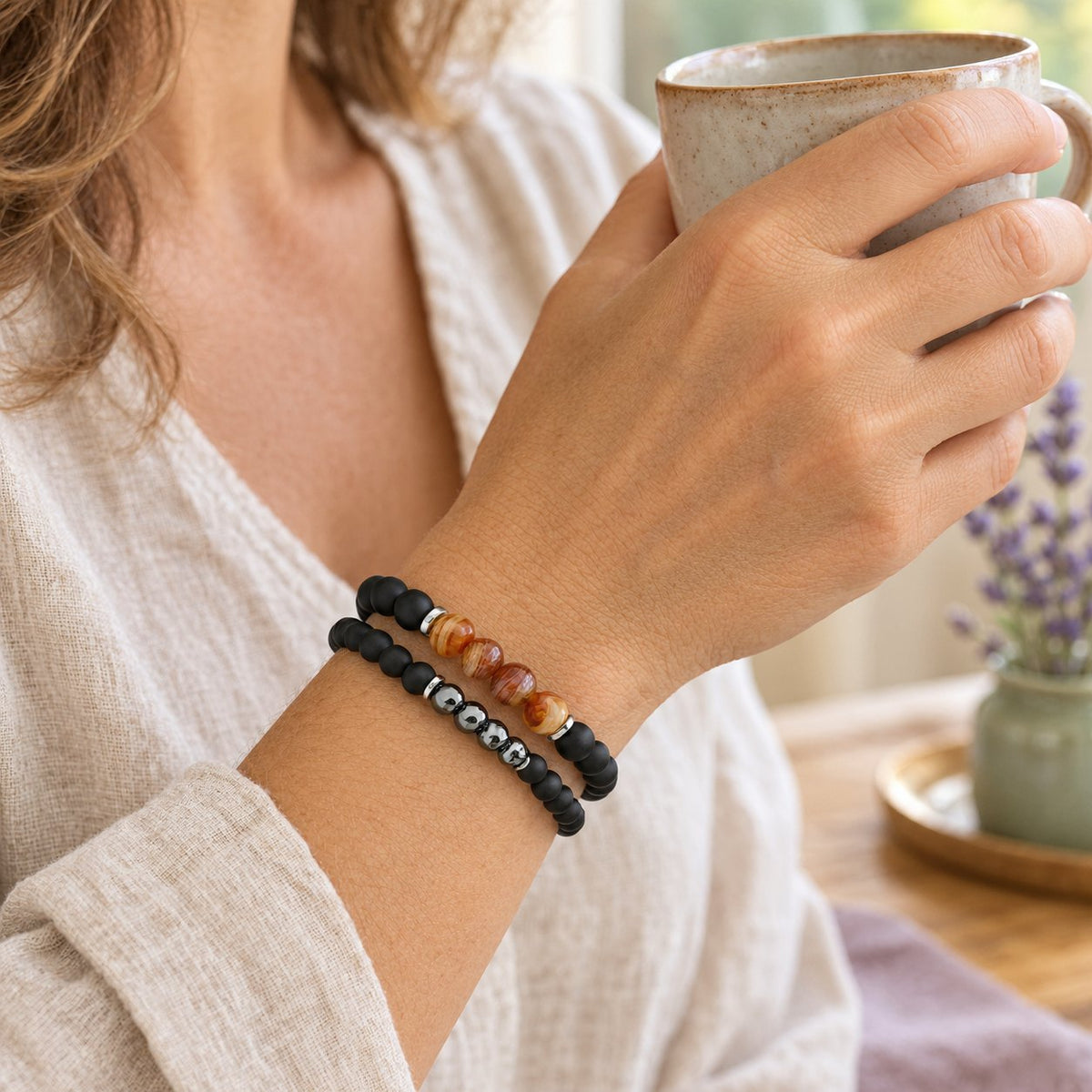 Hematite Agate Bracelet Set for Protection and Balance, worn by a woman