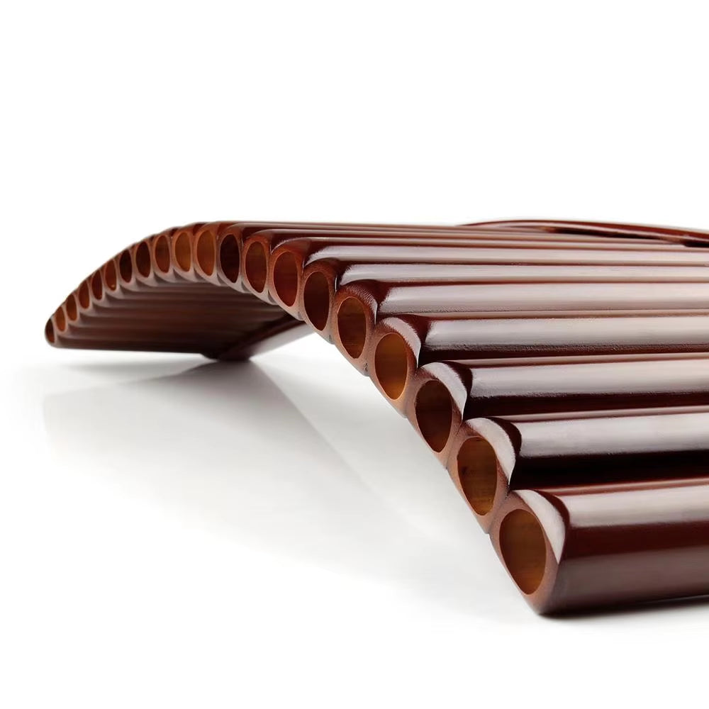 Curved wooden tubes in a descending pattern on a High Quality Bamboo Pan Flute E Key