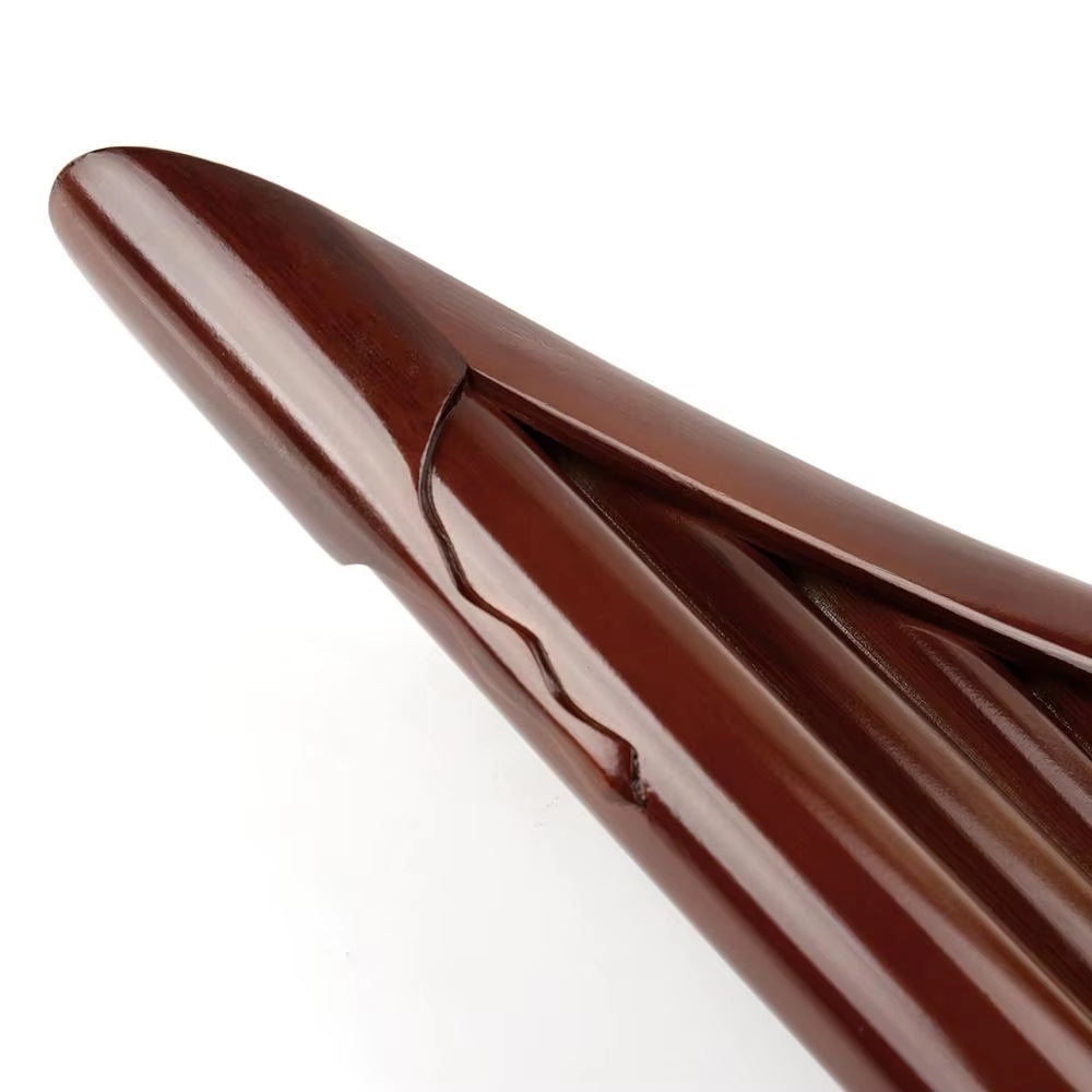 Shiny brown chocolate bar with geometric patterns alongside High Quality Bamboo Pan Flute