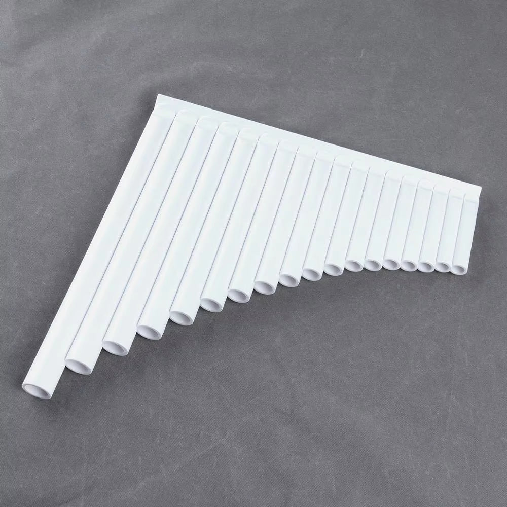 White C Key Bamboo Pan Flute with graduated plastic tubes in descending order