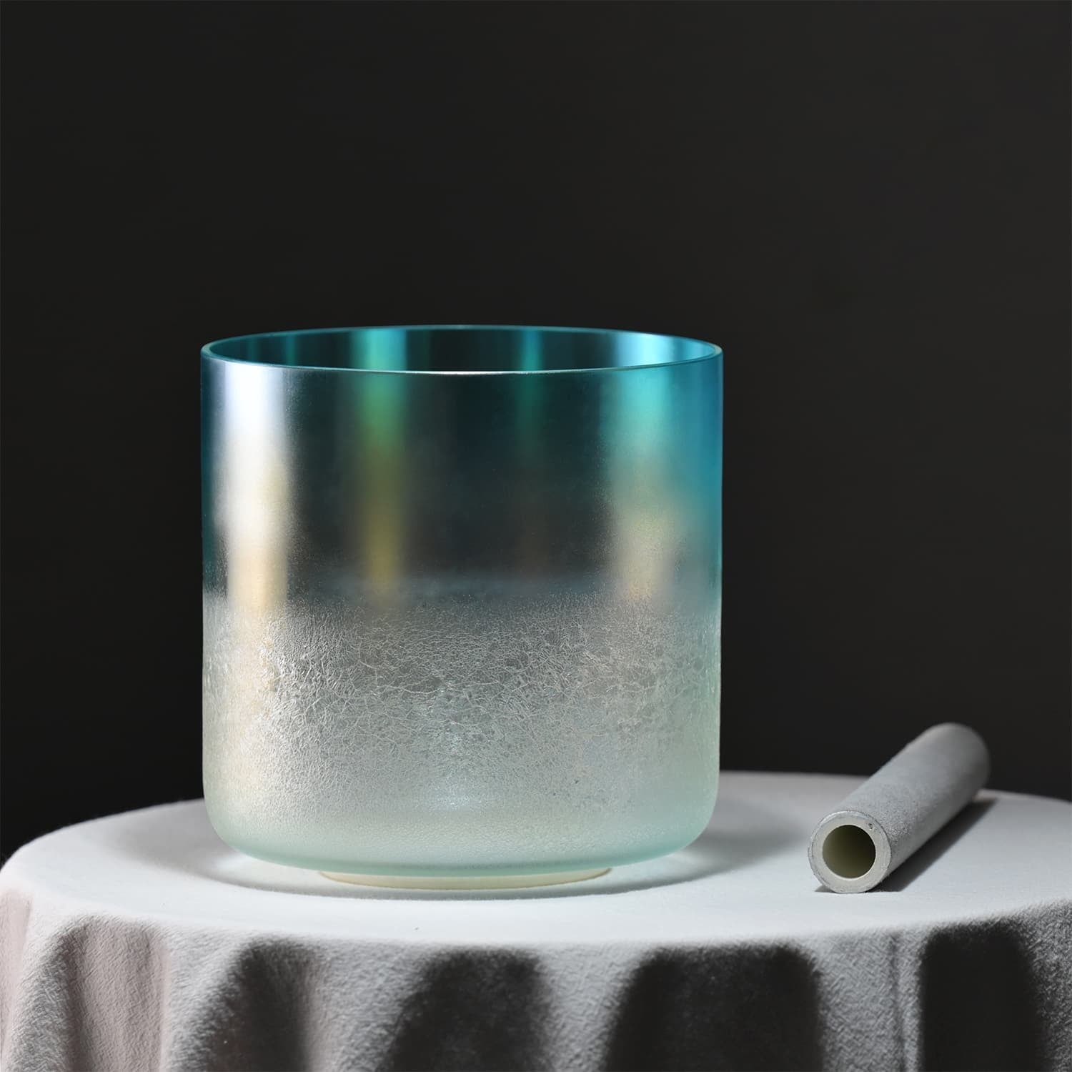 Frosted glass singing bowl with turquoise rim for sound healing and meditation