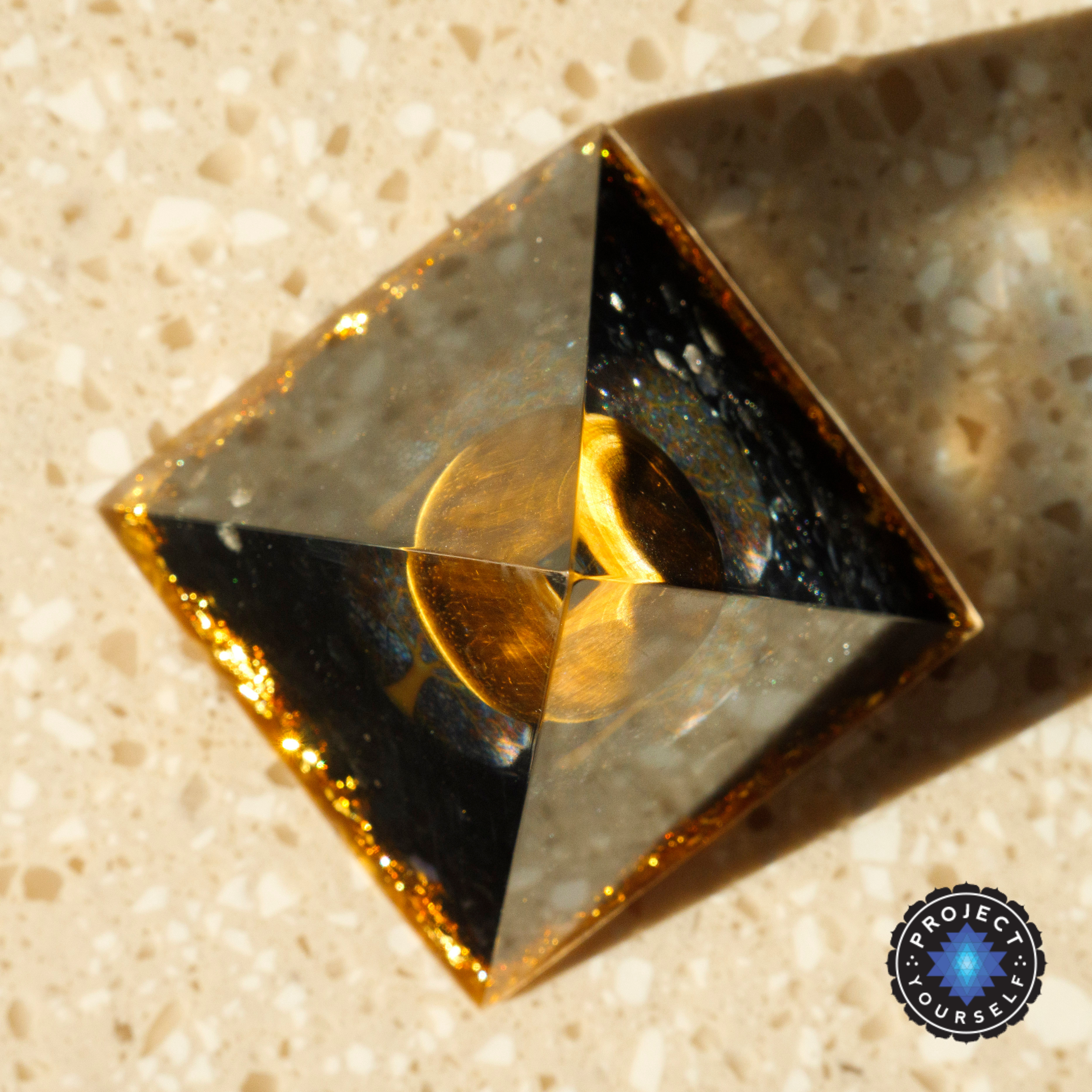Inner Calling Orgone Pyramid with Tiger Eye Stone