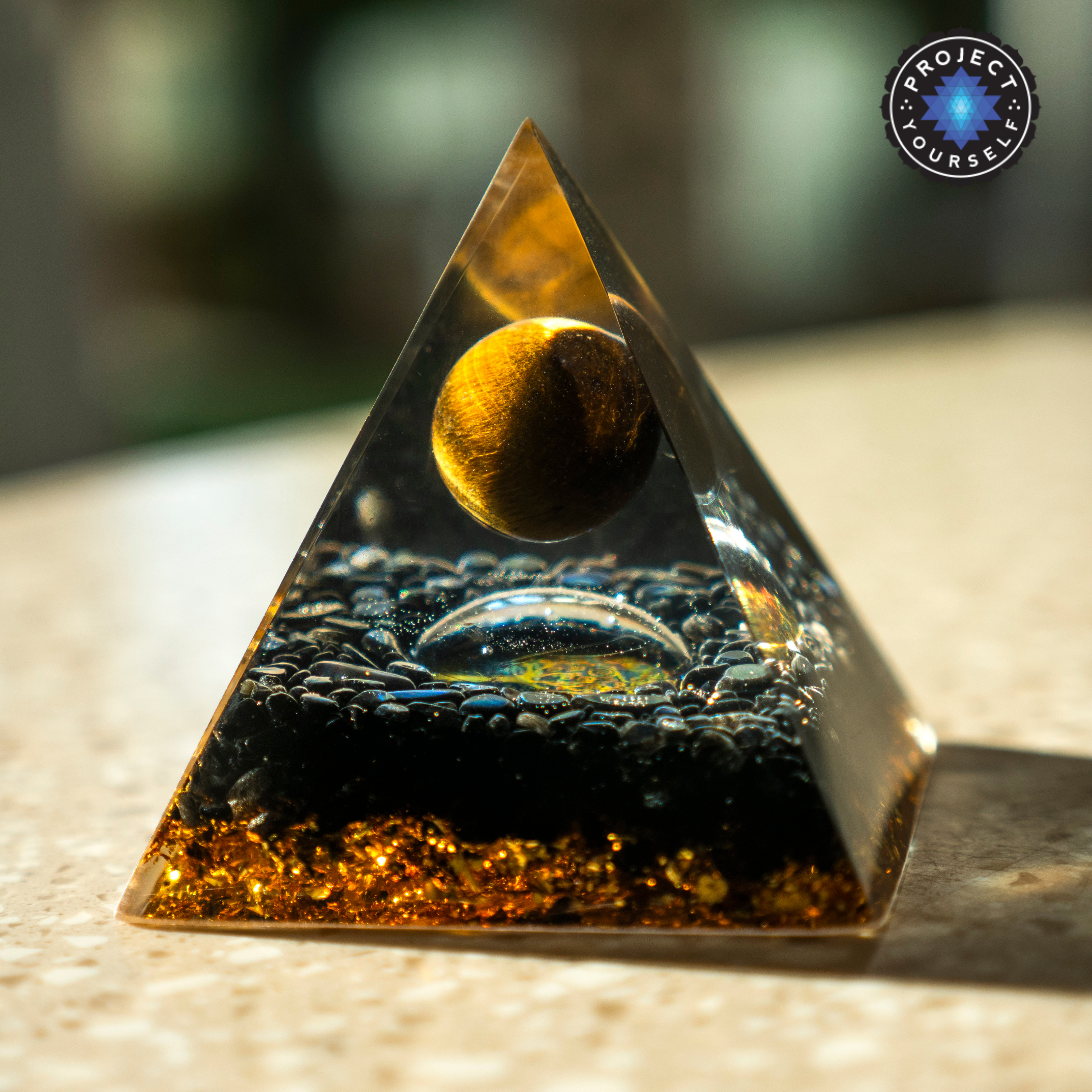Inner Calling Orgone Pyramid with Tiger Eye Stone