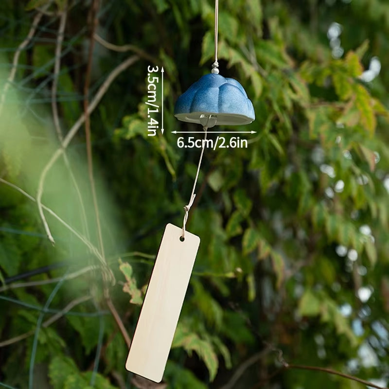 Blue ceramic wind chime with wooden hanger for Japanese outdoor decor