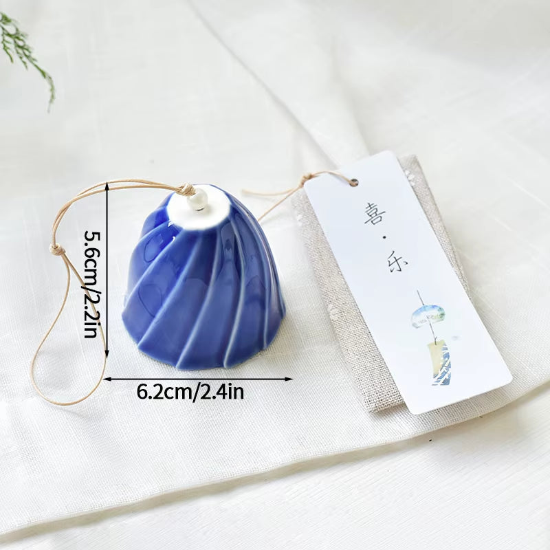 Blue and white ribbed ceramic bell, part of Japanese Ceramic Wind Chimes for outdoor decor