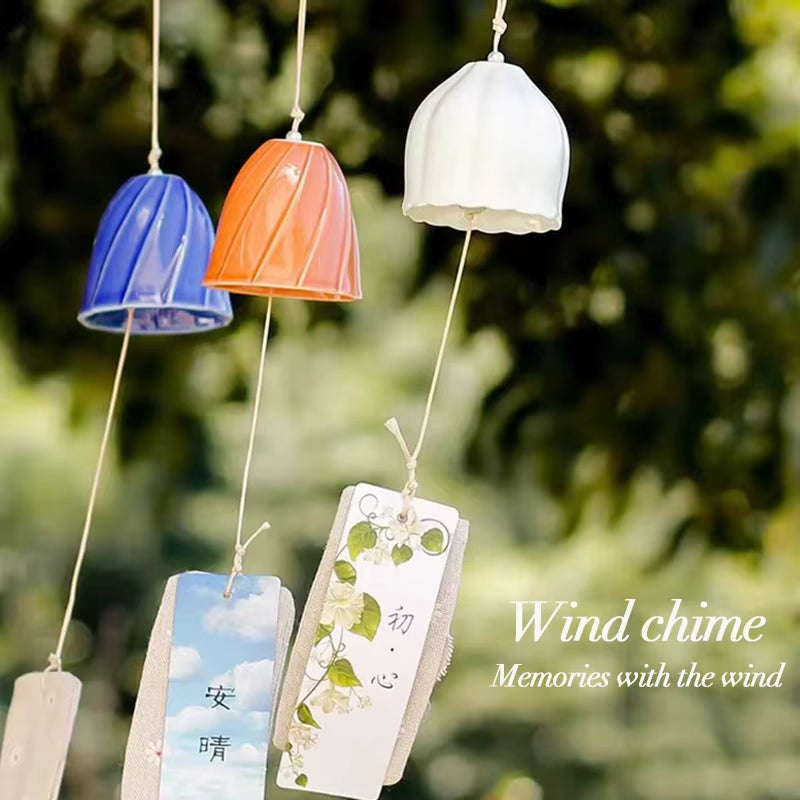 Decorative Japanese wind chimes with colorful bells and paper tags for outdoor decor