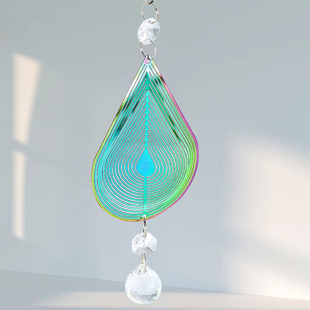 Teardrop crystal suncatcher with turquoise spirals in Kinetic Garden Wind Spinner