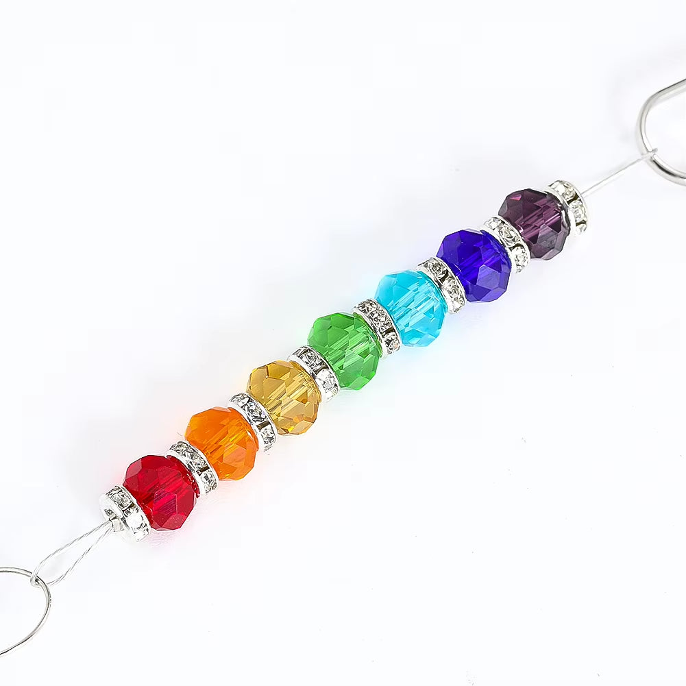 Rainbow crystal beads with silver spacers on a string for Kinetic Metal Wind Spinner