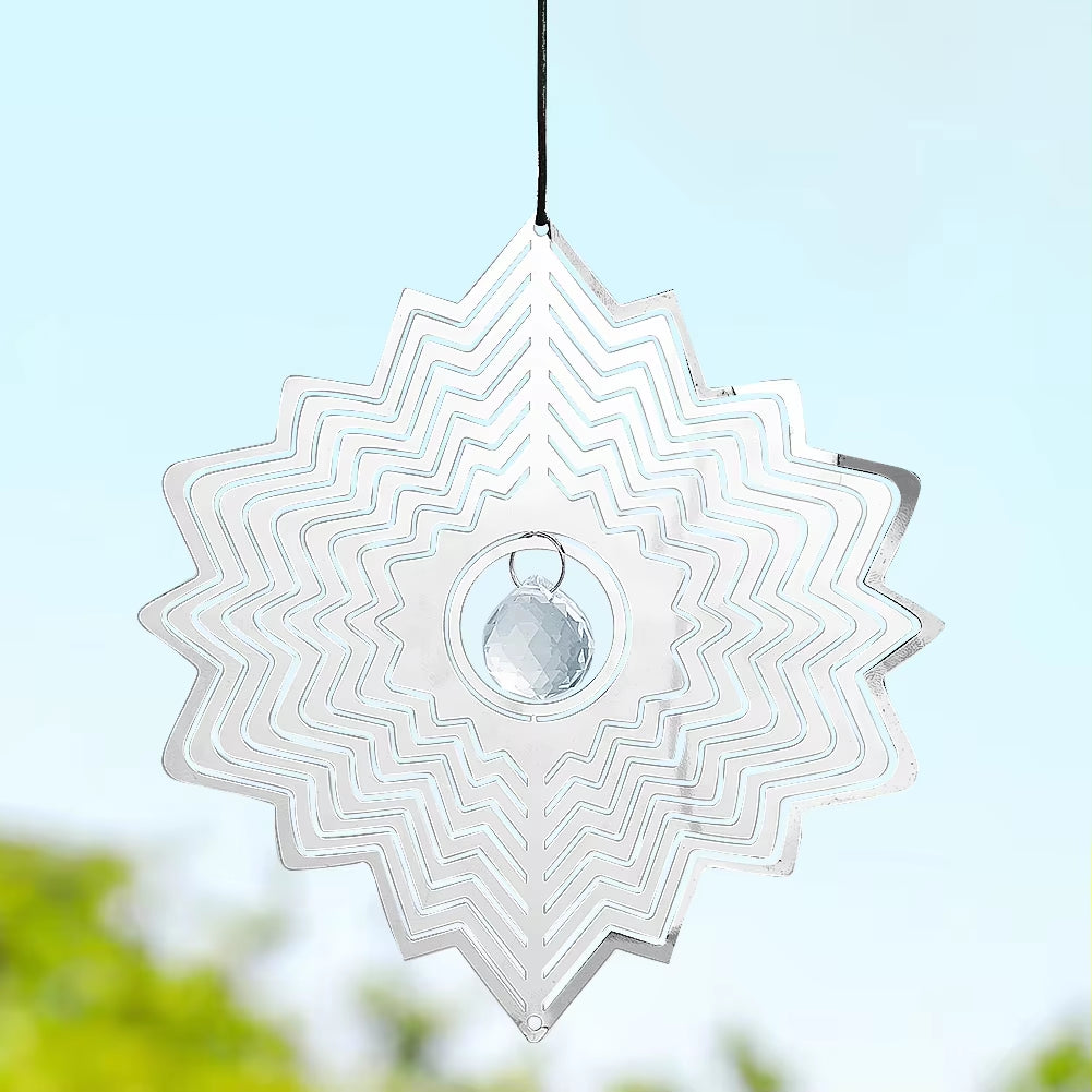 Star-shaped metal wind spinner with zigzag patterns in Kinetic Stainless Steel design