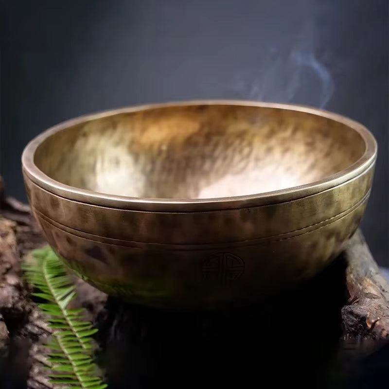 Steaming brass Tibetan singing bowl with hammered finish for meditation healing