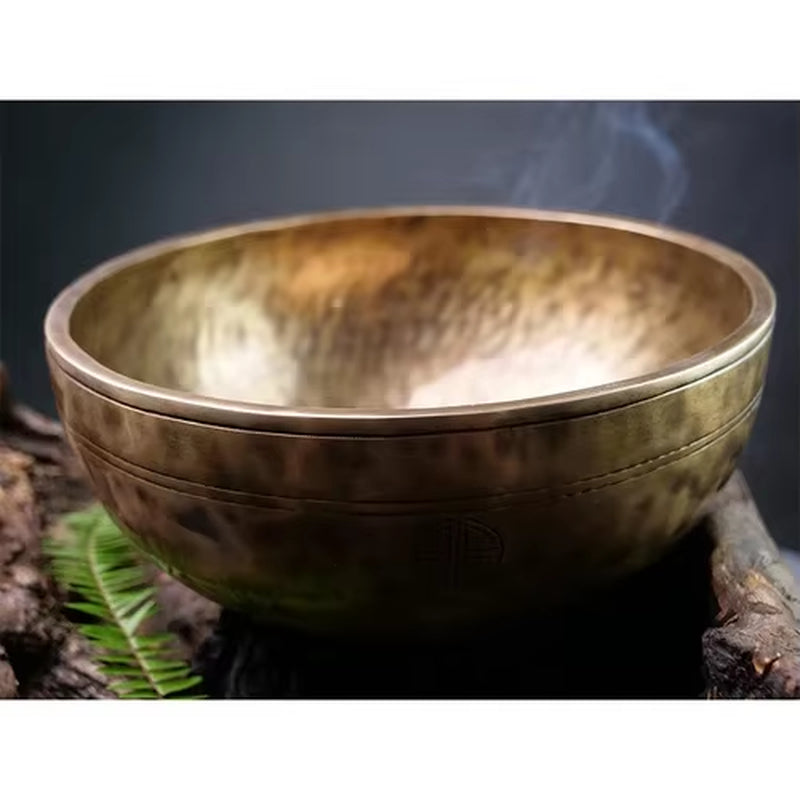 Large Tibetan Singing Bowl with steam rising for meditation and healing