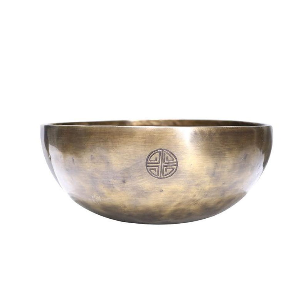 Metallic Tibetan singing bowl with etched symbol design in Large Tibetan Singing Bowl