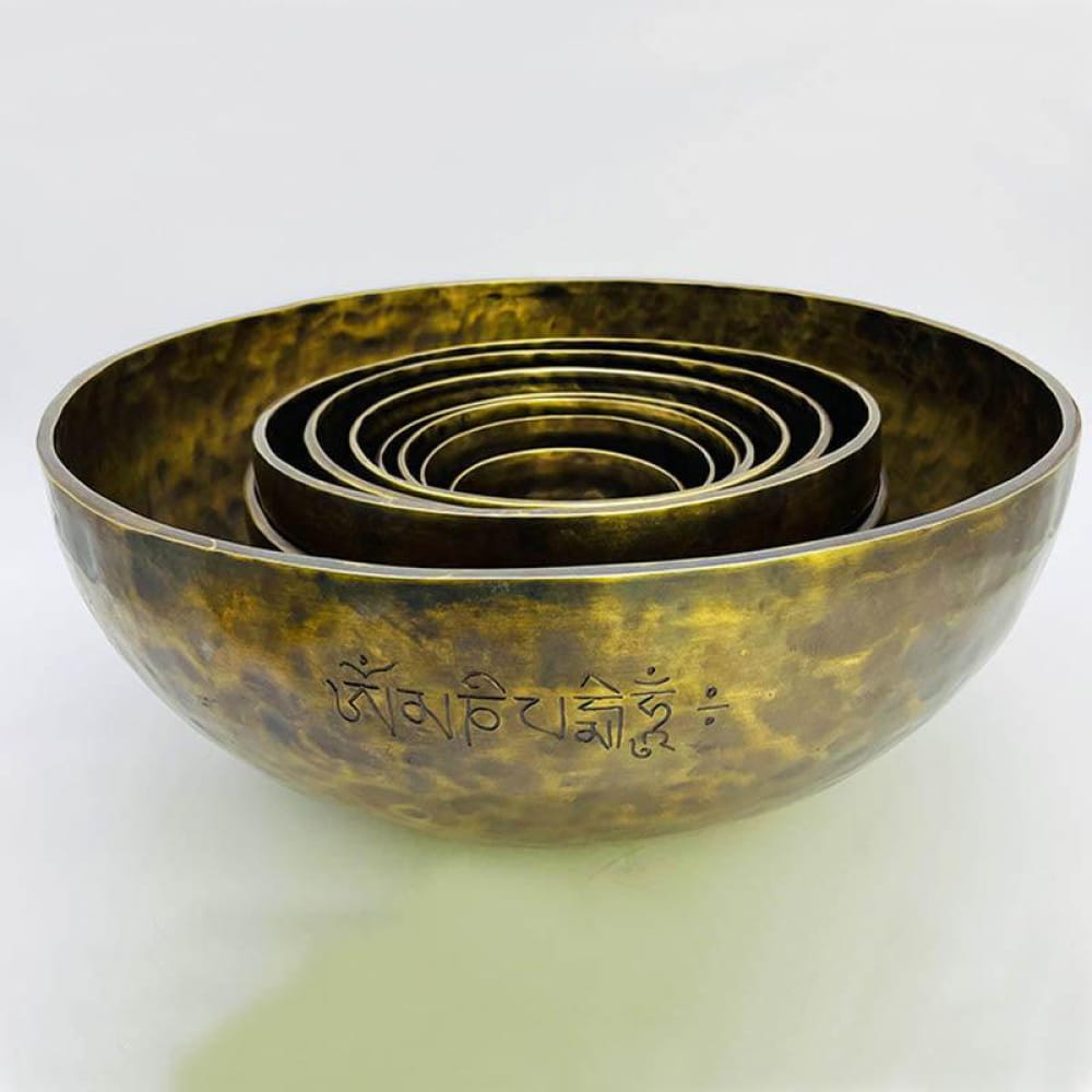 Nested bronze Tibetan singing bowls with etched Sanskrit for the Music Bowl Instrument