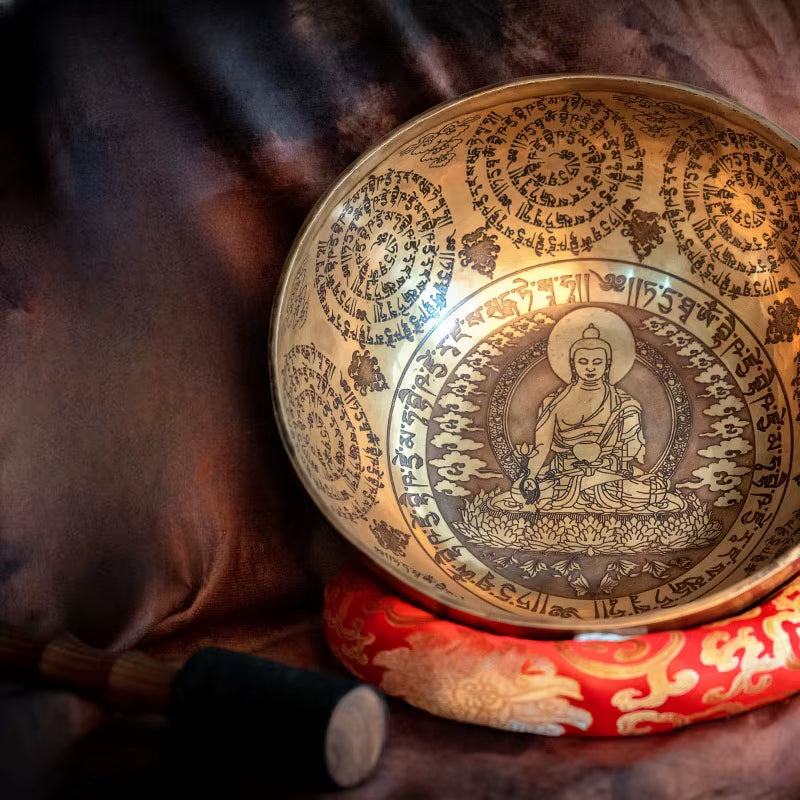 Large Tibetan Singing Bowl with intricate Buddhist engravings and mandalas for sound healing