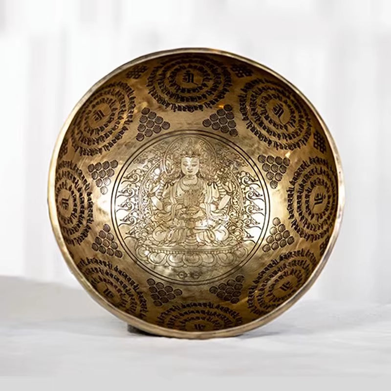 Large Tibetan Singing Bowl with intricate Buddhist engravings and mandala patterns