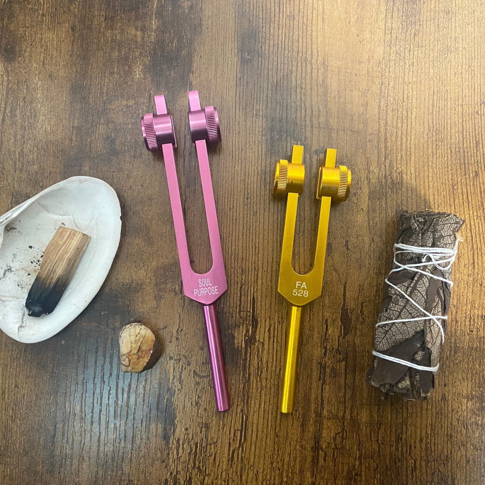 Pink and yellow tuning forks with sage smudge and shell in Merkaba Soul Purpose set