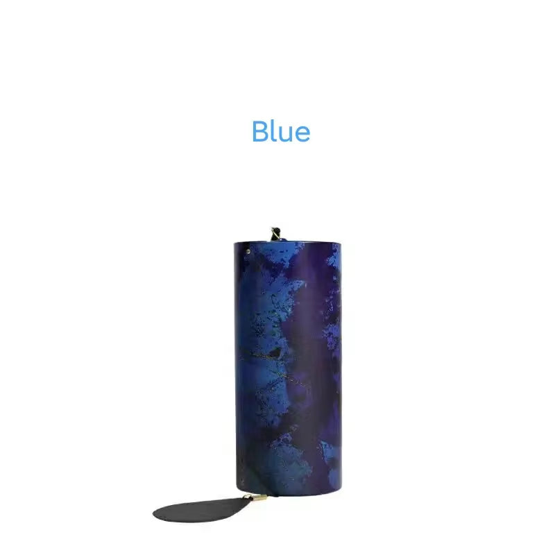 Deep blue cylindrical candle with marbled texture for Metal Koshi Wind Chimes Elements