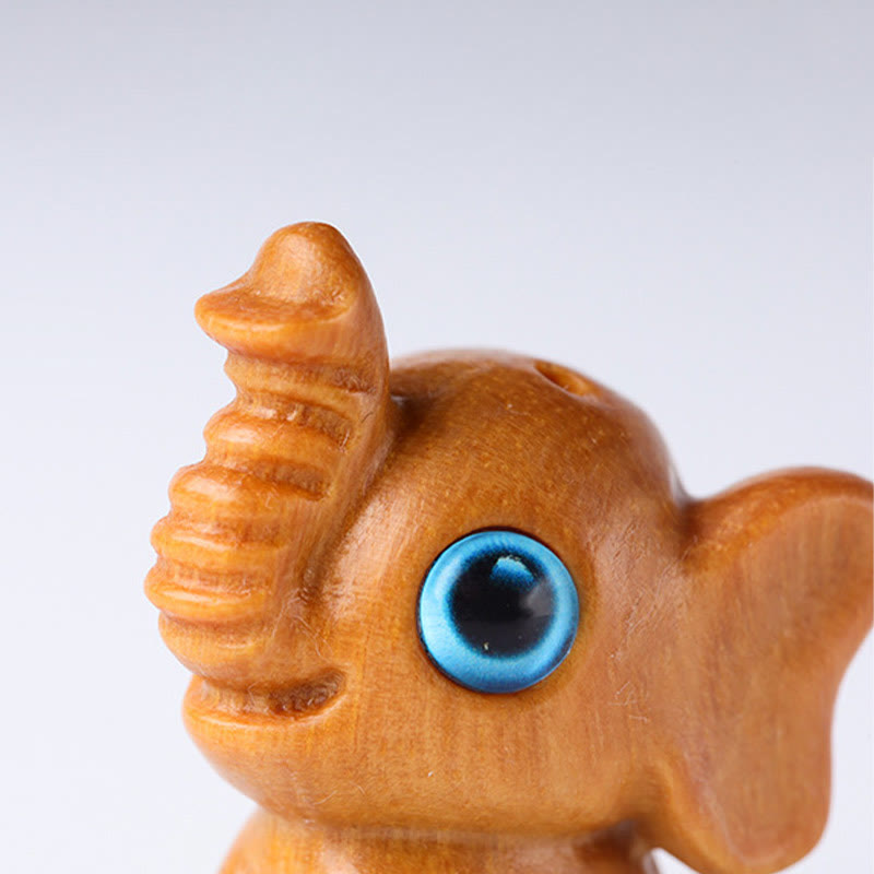 Mini Elephant Carved Decoration in Sandalwood for Protection & Luck