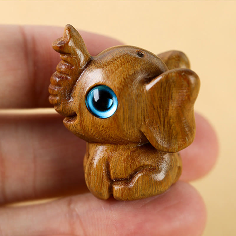 Mini Elephant Carved Decoration in Sandalwood for Protection & Luck