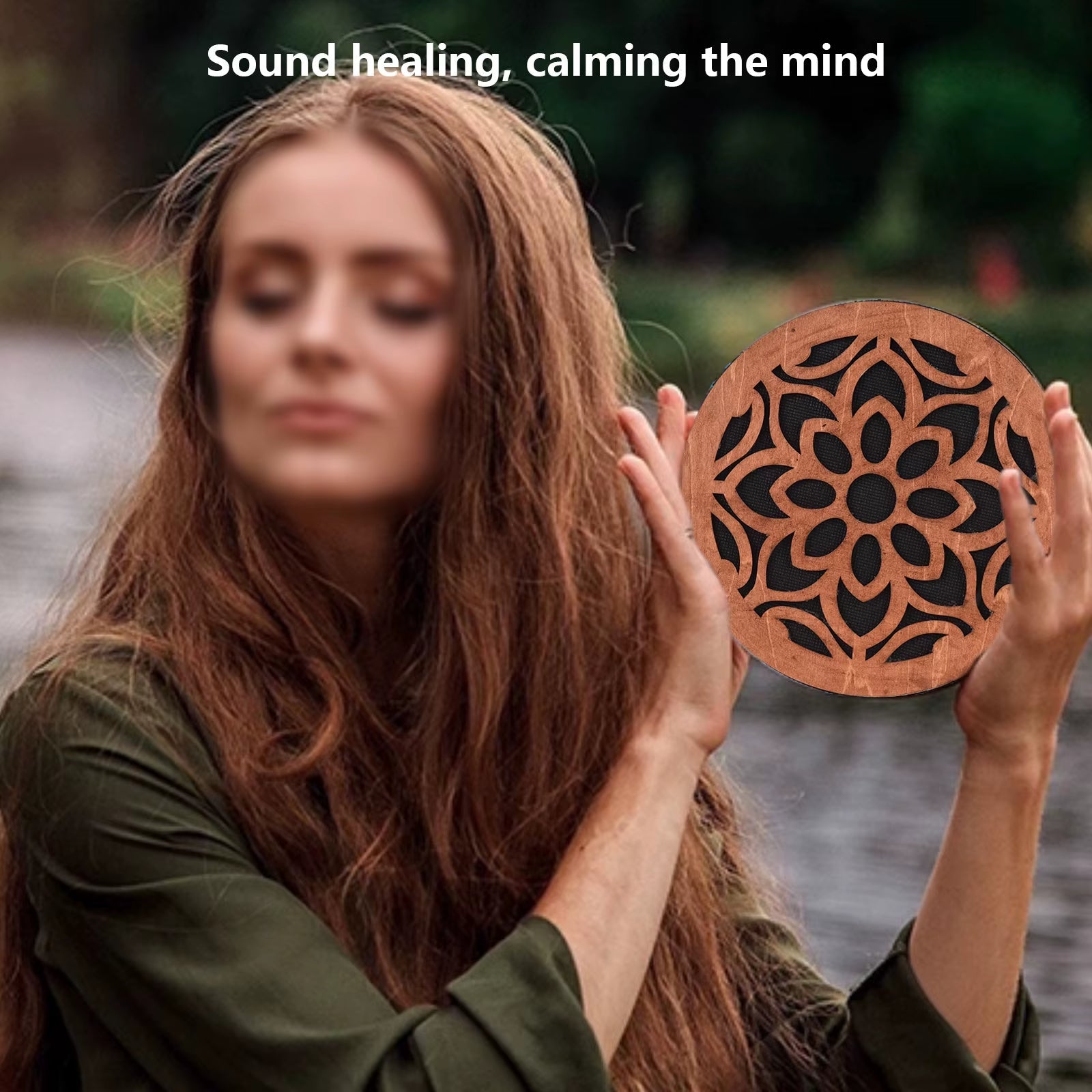 Wooden mandala disc with floral cutouts on Ocean Drum Instrument for sound therapy relaxation