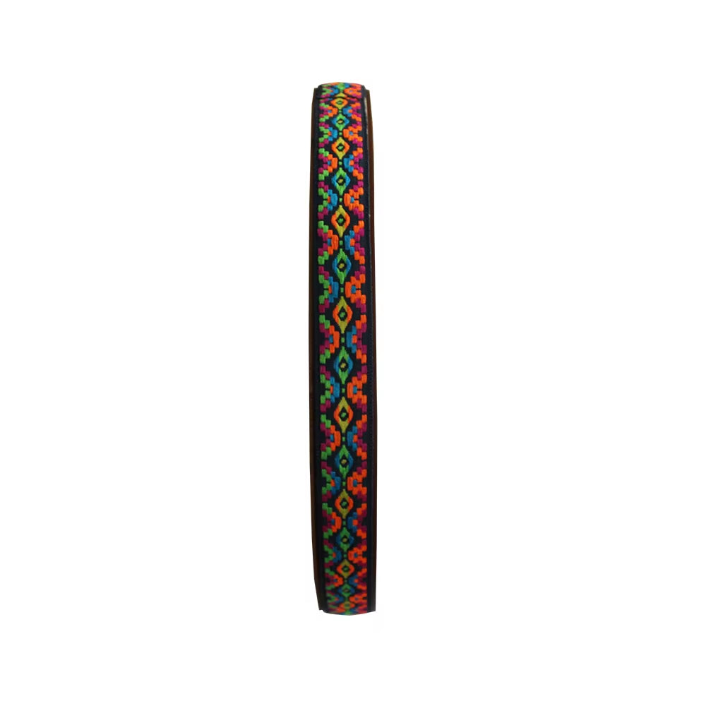 Colorful woven fabric band with geometric diamond patterns on Ocean Drum Instrument