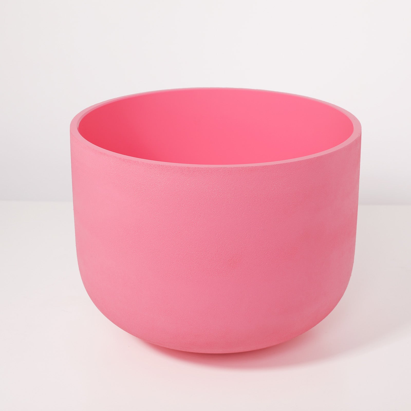 Pink ceramic bowl with rounded bottom for healing meditation and chakra balancing