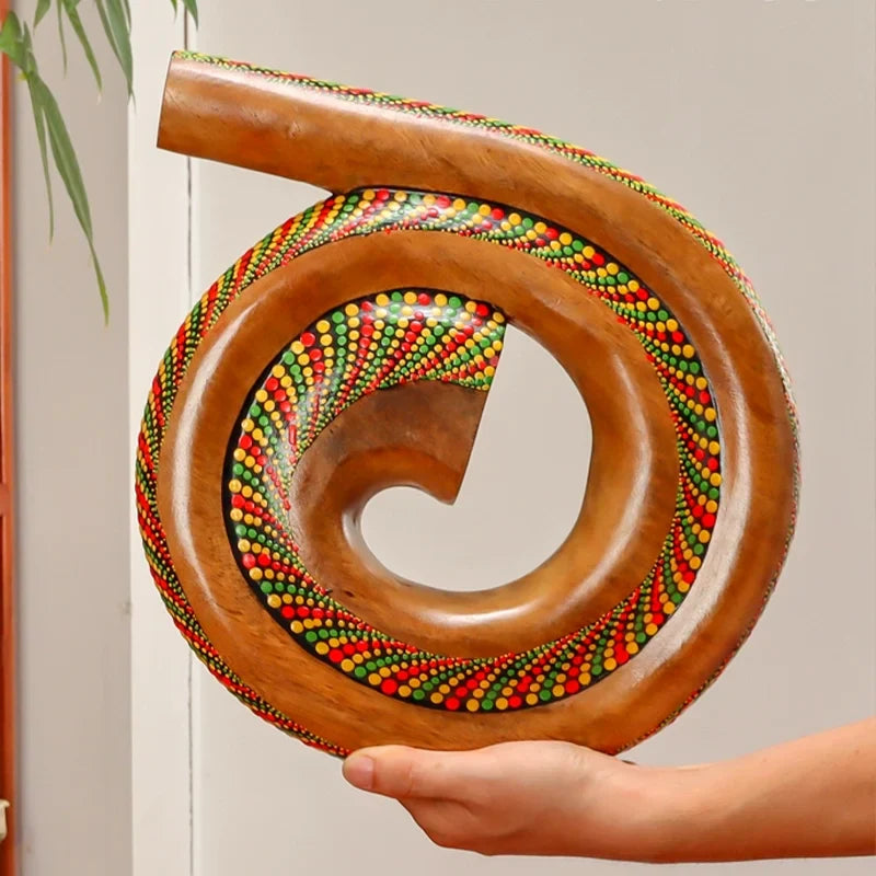 Spiral wooden didgeridoo with red, green, and white beadwork for the Portable Spiral Didgeridoo