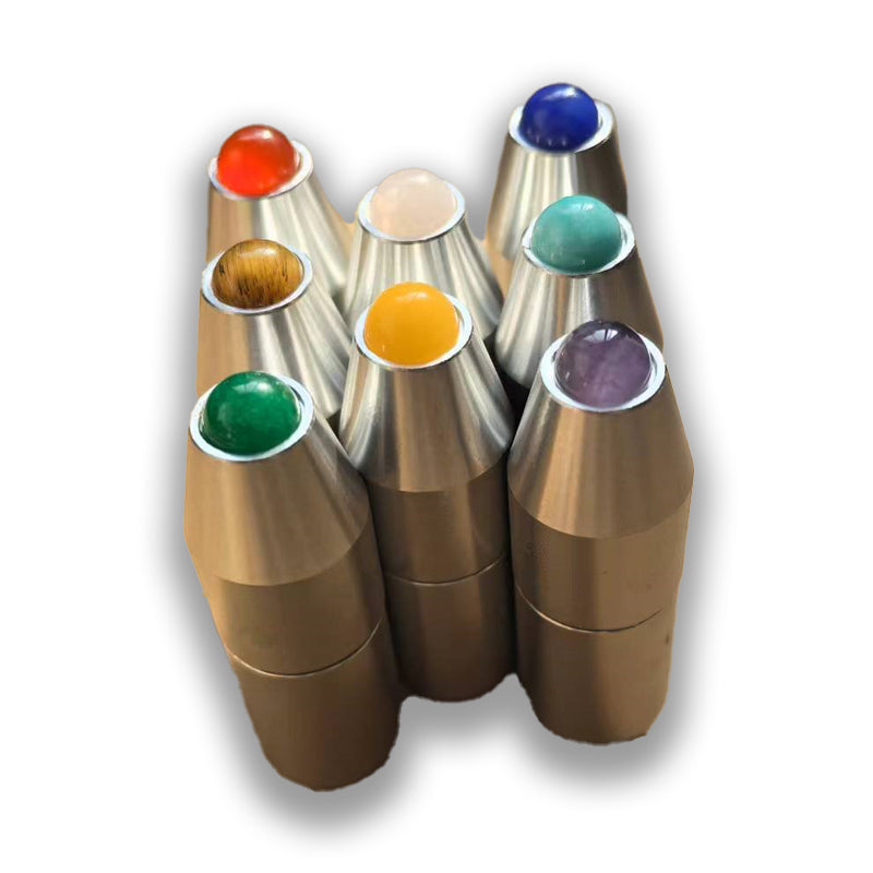 Metal cones filled with colorful pigments for the Silver Chakra Tuning Forks Set