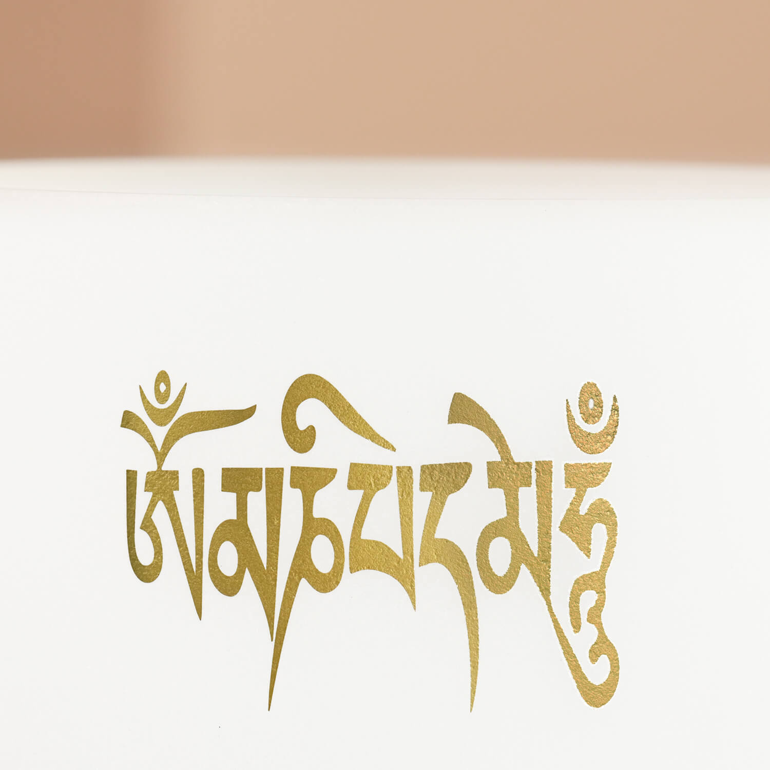 Golden Tibetan script in ornate calligraphy on Six-Syllable Mantra Singing Bowl