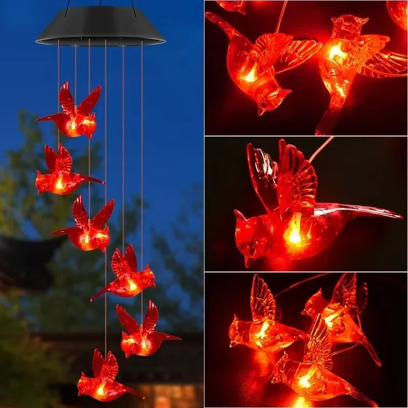 Red illuminated hummingbird wind chime with LED lights for outdoor decoration