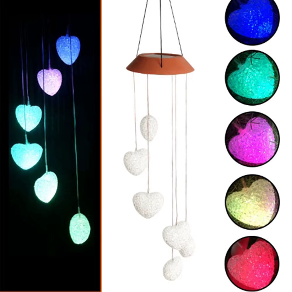 Color-changing LED heart-shaped wind chime with decorative elements for outdoor decor