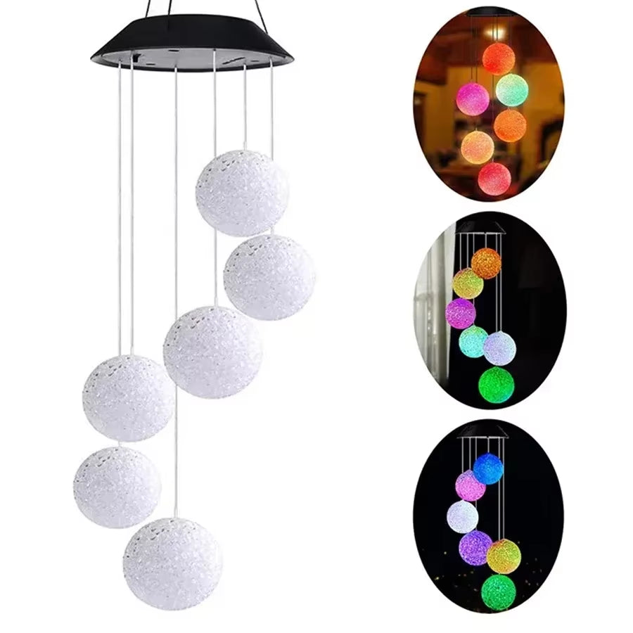 Color-changing LED wind chime with crystal balls under a black umbrella top for gardens