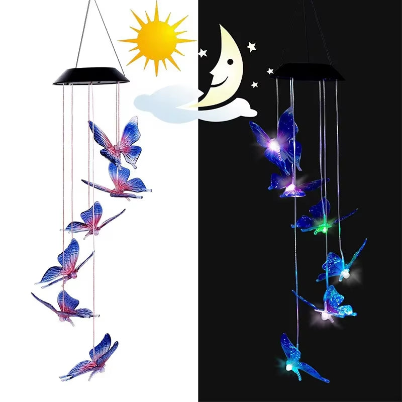 Solar LED Butterfly Wind Chimes glowing at night, perfect for garden decor