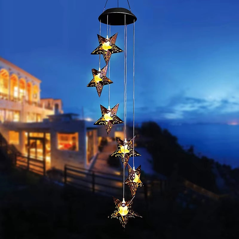 Solar Memorial Wind Chimes with LED star lights in a vertical arrangement