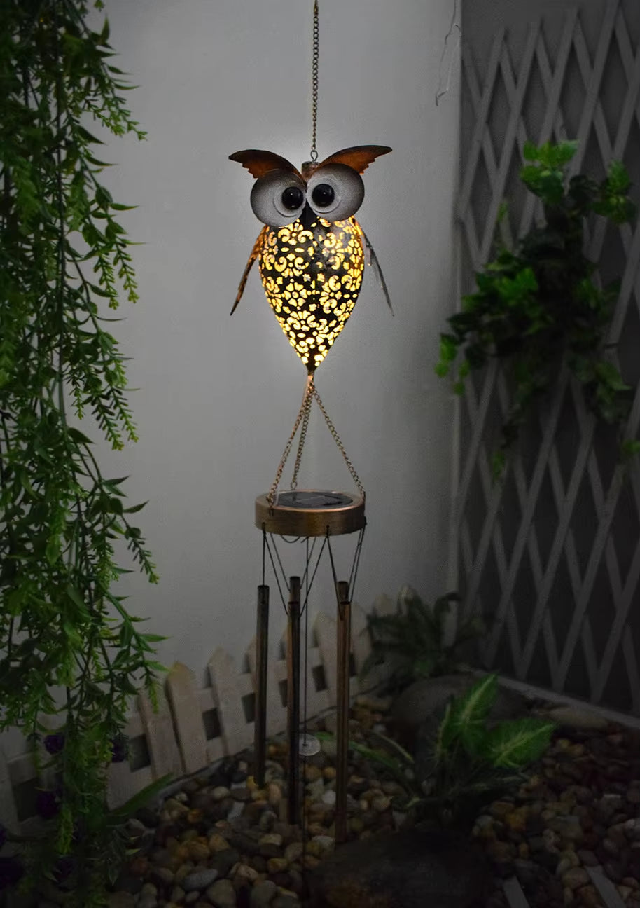 Illuminated Solar Owl Wind Chime with yellow patterned body and metal tubes