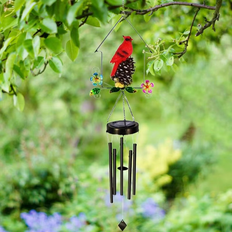 Bright red Cardinal on Solar Wind Chimes for Garden Decor Outdoor Use