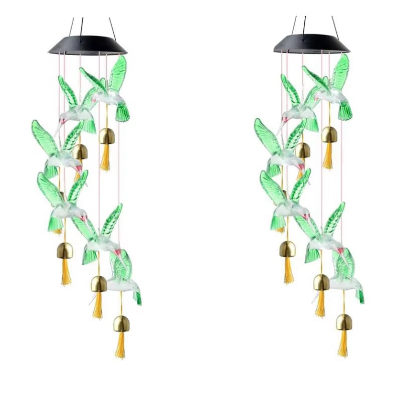 Wind chimes with green hummingbirds and brass bells for garden decor with LED lights