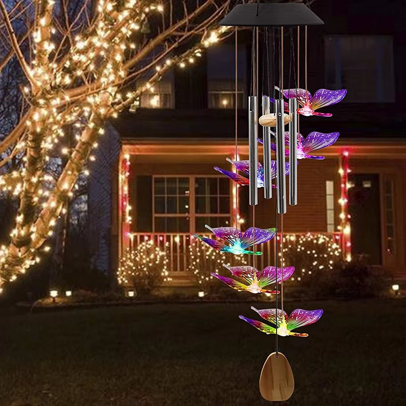 Color-changing LED butterfly wind chime with metal chimes and wooden base for outdoor decor